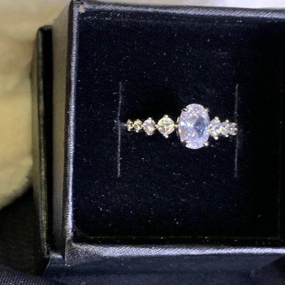 Silver Toned Ring with Oval Clear Stones With Eight Smaller Stones - Picture 5 of 12